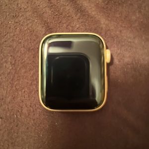 Apple Watch Series 4, 44mm in gold aluminum.